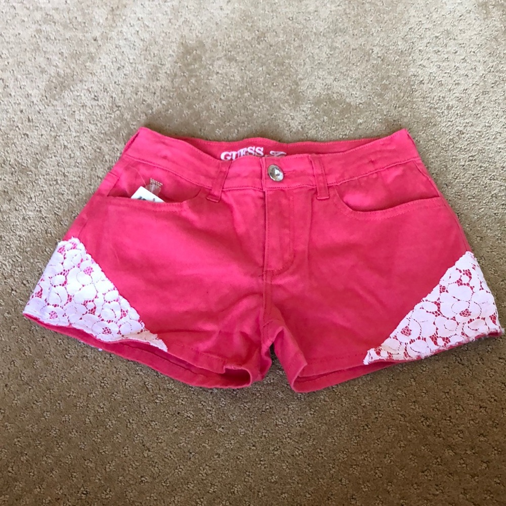 Pink Guess shorts with white lace.